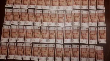 В Смоленской области сотрудники полиции изъяли у мужчины более 50 поддельных денежных купюр